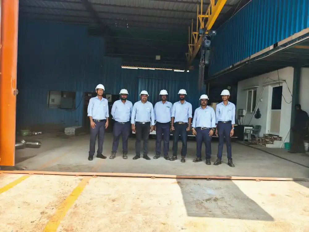 Engineers and fabricators at factory